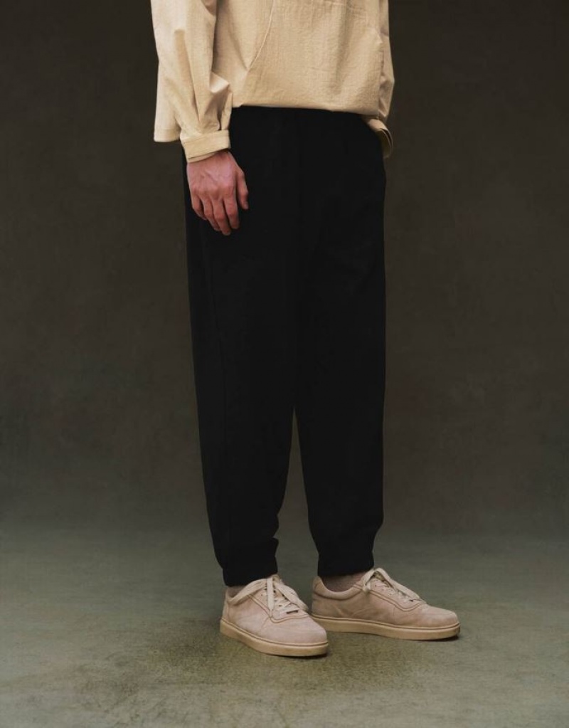 Black Urban Revivo Elastic Waist Knitted Men's Joggers | HWJDNY-173